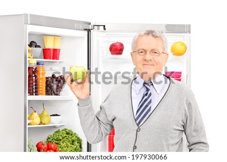 blue nutrition cafe glass taking refrigerator Senior the on apple out isolated of white man