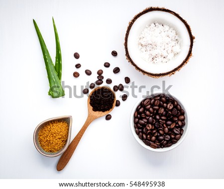 Body Scrub Of Ground Coffee And Coconut In The Shell On White Background Homemade Cosmetic Body Scrub Of Ground Coffee And Coconut In The Shell On White Background Homemade Cosmetic