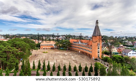 DA LAT, VIETNAM, NOV 20, 2016: University landscape in the city of Da Lat , highland Da Lat city fog in the morning ( view from drone )