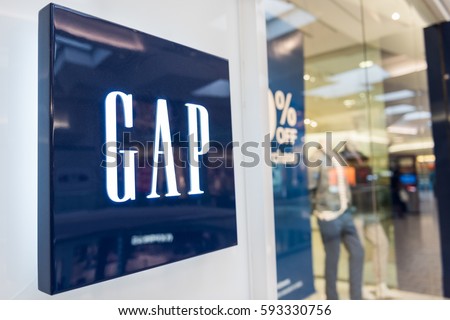 Fairfax, USA - February 18, 2017: Gap storefront with logo by entrance