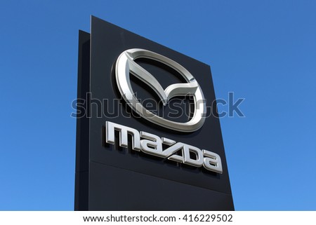 ORMESSON SUR MARNE, FRANCE - MAY 5, 2016: Mazda sign. Mazda Motor Corporation is a Japanese automotive manufacturer