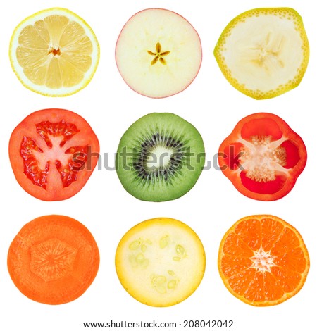 Slices of fruit and vegetables isolated on white - stock photo