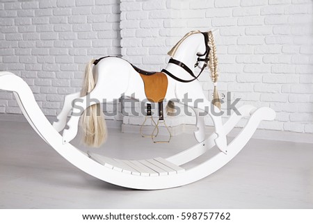photo of children's horse swing