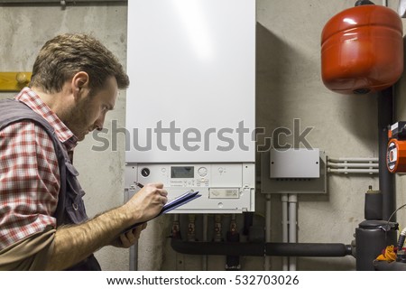 plumber who carries out the maintenance of a condensing boiler