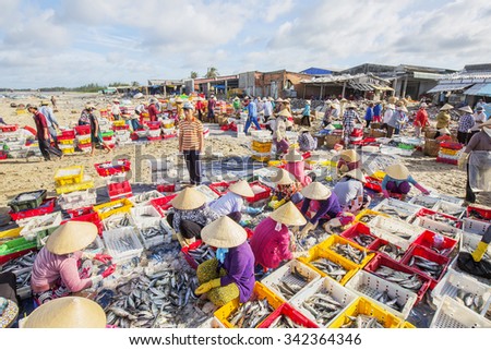 VUNG TAU, VIETNAM - AUG 22,2015: Fishermen on beach at the Fishing Village Long Hai, Vietnam