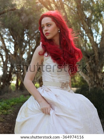 https://thumb9.shutterstock.com/display_pic_with_logo/3644120/364974116/stock-photo-portrait-of-a-red-haired-fantasy-woman-wearing-white-dress-forested-location-364974116.jpg