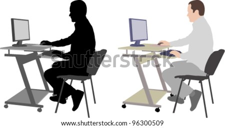 man sitting in front of computer