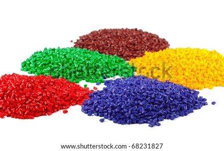 Colorful plastic polymer granules isolated on white