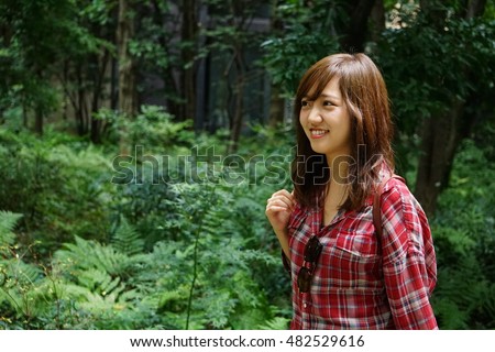 https://thumb9.shutterstock.com/display_pic_with_logo/3778364/482529616/stock-photo-young-japanese-woman-walking-in-a-mountain-or-forest-482529616.jpg