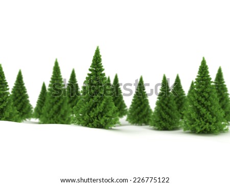 Green spruce trees in snow isolated on white
