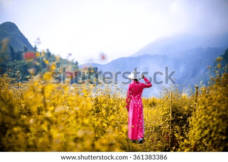 A beautiful girl in Ao dai,Vietnamese Dress at Sa-pa, Vietnam