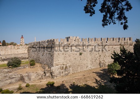 RHODES, RHODES CITY, GREECE - APRIL 23, 2017 ; Ruins of the castle and city walls of Rhodes. Defensive Fortress of the Joannites. Historic castle on the shores of the Aegean and Mediterranean.