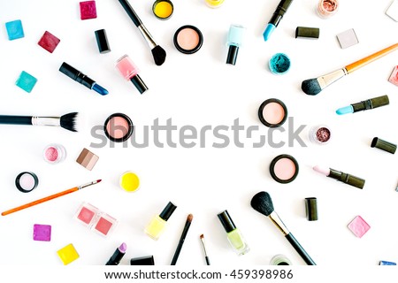 flat lay female cosmetics collage frame with lipstick, brush on white background. top view set