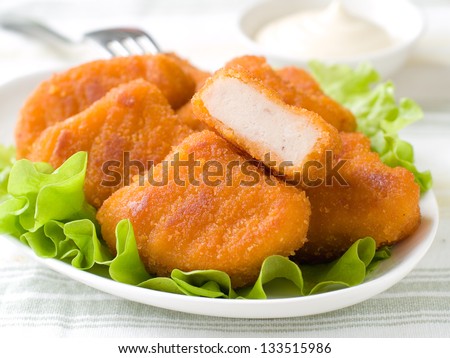 Chicken nuggets with mayonnaise, selective focus - stock photo