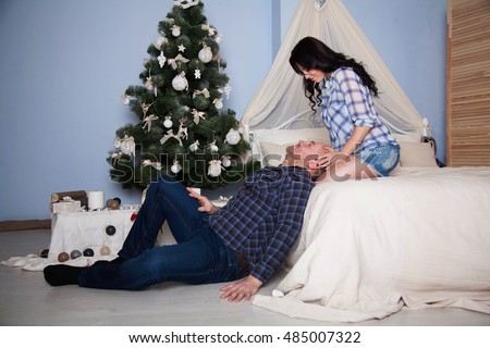 http://thumb9.shutterstock.com/display_pic_with_logo/4021411/485007322/stock-photo-cute-couple-in-love-hugging-and-having-fun-in-bed-on-holidays-near-christmas-tree-485007322.jpg