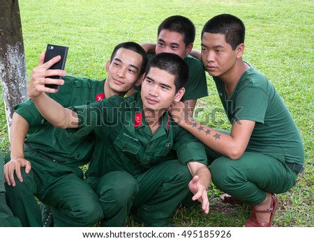BAC GIANG, VIET NAM, July 14, 2016 the group soldiers, army Vietnam, souvenir photograph, resting, place the school sports