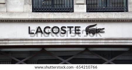 LONDON - AUGUST 6: A London Lacoste store logo is shown here on August 6, 2015. Lacoste saw sales of 1.95 billion euros in 2015.