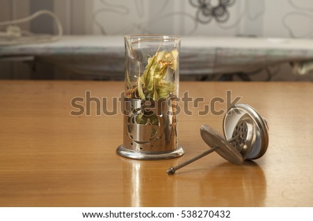 stock photo teapot with press on the wooden table 538270432