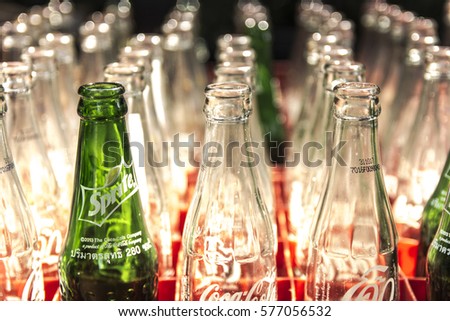 Empty glass bottle of Coke and Sprite soft drink. Glass bottles in plastic crates. Keep orderly Restaurants in Thailand "Ban Bang" in Bangkok.