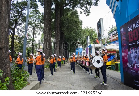 HO CHI MINH CITY, VIET NAM - NOV 24, 2016: A young band playing their concert on the street, in front of Nha Van Hoa Thanh Nien, Sai Gon, Viet Nam.