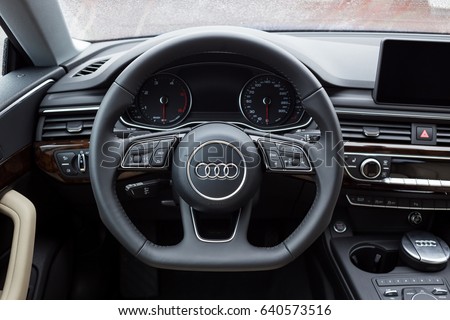 Vinnitsa, Ukraine - May 14, 2017. Audi A5 Sportback car.Front of the car, logo Audi,TFSI engine, quattro system, sportcar, luxury car,sport sedan. Presentation of the new model car- Audi A5 Sportback