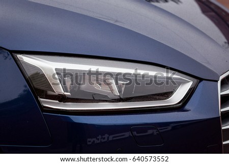 Vinnitsa, Ukraine - May 14, 2017. Audi A5 Sportback car.Front of the car, logo Audi,TFSI engine, quattro system, sportcar, luxury car,sport sedan. Presentation of the new model car- Audi A5 Sportback
