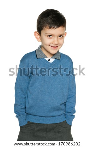 A portrait of a smiling young boy on the white background
