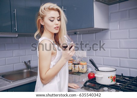 Attractive Girl Cooking On Her Kitchen Stock Photo 530457229 ...