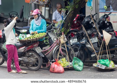 Hanoi Vietnam September 26 2016 .Street vendors in Hanoi's Old Quarter( Pho Co Hanoi). Hanoi, Vietnam, Street vendors sell a lot of things, fruits, flowers, personal items, etc..