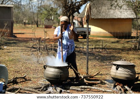 Cast Iron Cooking Pots On Wood Stock Photo 135612338 