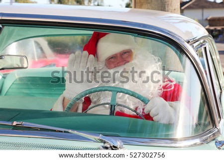 Santa Claus arrives in style in his Classic Car. Santa loves to deliver presents in his car when his Reindeer are tired. Santa Drives