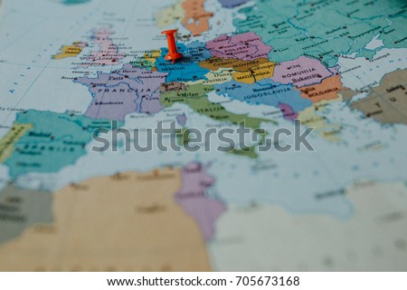 red pin on the map and travel destination europe
