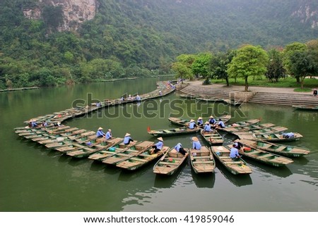 Queue of boats in Tam Coc - Ninh Binh province - Vietnam