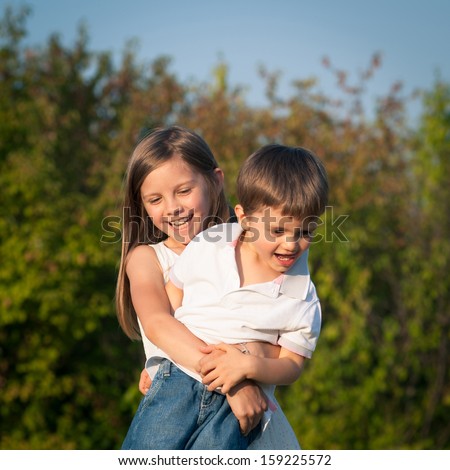 Brother Her Hugging Little Sister Stock Photos, Brother Her Hugging ...