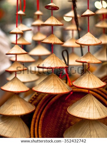 String of multi sized conical Vietnamese hats for sale in Hanoi, Vietnam