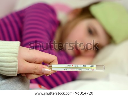 Mother Check Daughters Fever On Thermometer Stock Photo ...