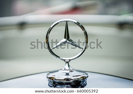PAAREN IM GLIEN, GERMANY - JUNE 03, 2017: The famous three-beam star of Mercedes-Benz. Hood ornament, close-up. Exhibition "Die Oldtimer Show".
