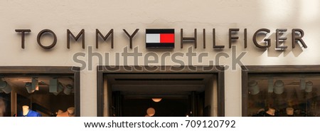 Prague, Czech Republic - August 27, 2017: Tommy Hilfiger sign and store front, a brand that is known as an American multinational corporation that designs and manufactures upper market apparel .