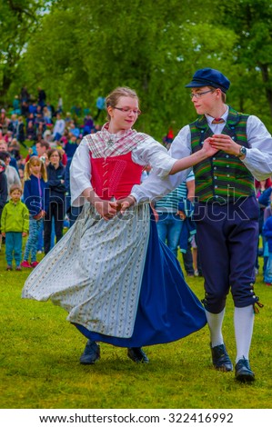"So Anna Von Reitz has a Different Point of View?" by Jo Ana - 5.4.18 Stock-photo-gothenburg-sweden-june-unknown-dancers-in-traditional-swedish-dress-dancing-around-the-322416992
