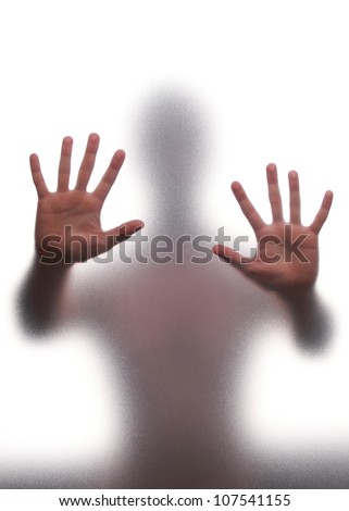mystic silhouette man against transparent wall stock photo mystic silhouette man against transparent wall stock photo