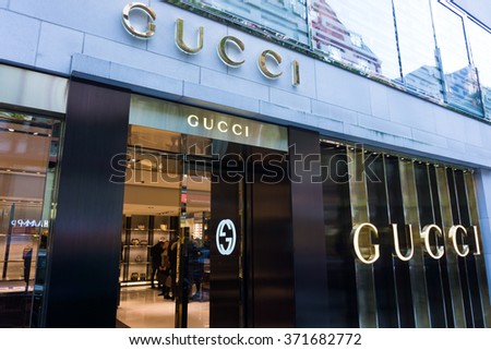 FRANKFURT, GERMANY - OKTOBER 24, 2015: Gucci signage at store entrance. Gucci is an Italian fashion label owned by French company PPR. Gucci was founded by Guccio Gucci in Florence in 1921