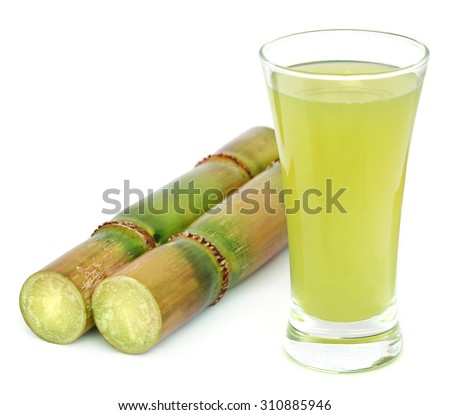 Piece of sugarcane juice over white background