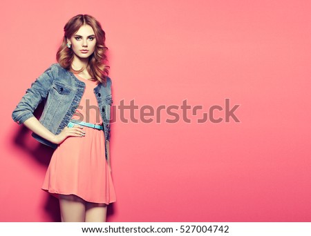 Beautiful Young Girl Solo - Fashion portrait of beautiful young woman in a summer dress. Beauty spring  photo