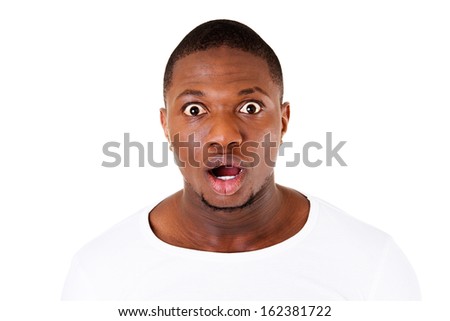 Handsome male's face showing surprise/shock.