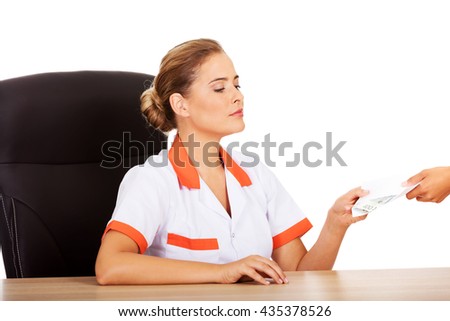 2 female doctors take on their muscular patient 3