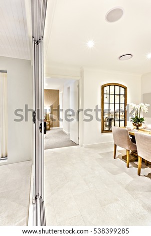 Modern Dining Room Hallway With Entrance To Other Side Including A Glass Window Near Table Modern Dining Room Hallway With Entrance To Other Side Including A Glass Window Near Table