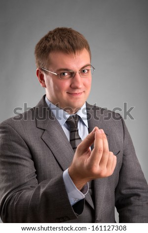 stock-photo-show-me-the-money-hand-sign-