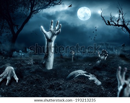 Zombie hand coming out of his grave Zombie hand coming out of his grave
