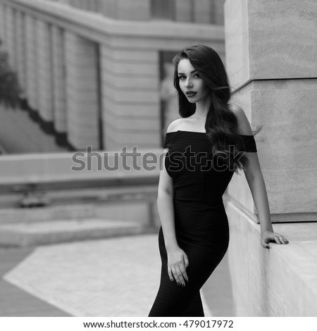 https://thumb9.shutterstock.com/display_pic_with_logo/571009/479017972/stock-photo-black-and-white-portrait-of-young-beautiful-elegant-woman-in-black-dress-pretty-sensual-girl-with-479017972.jpg