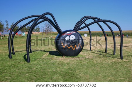 a giant halloween spider on the farm made of covered hay bales and irrigation tubing - Giant Halloween Spider a giant halloween spider on the farm made of covered hay bales and irrigation tubing - Giant Halloween Spider